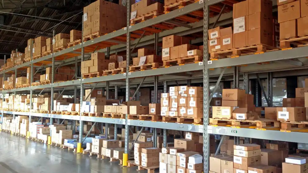 Warehouse racking stocked with boxed products